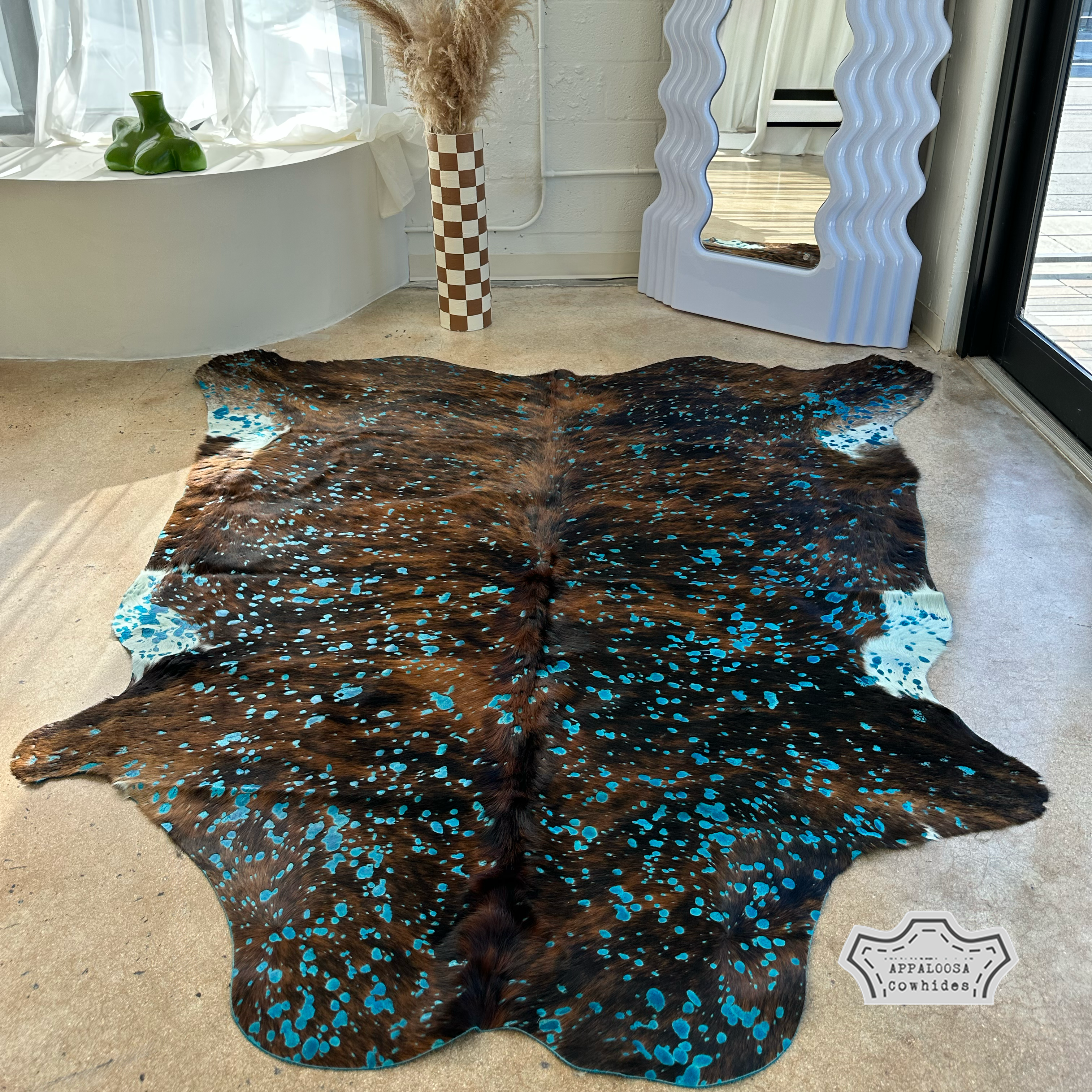 Turquoise Devore on Brindle Cowhide Rug
